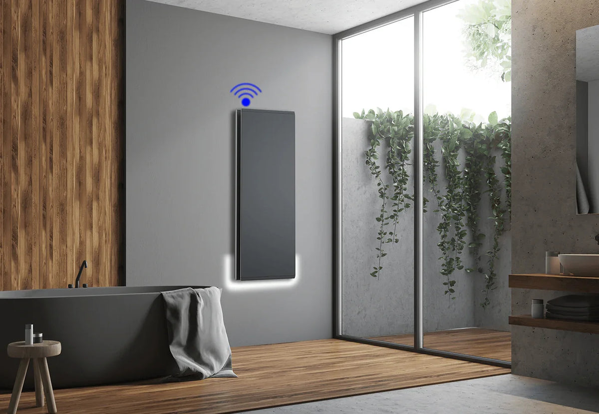 Riscaldatore elettrico smart a parete in un bagno moderno con vasca e vista esterna | Klimago