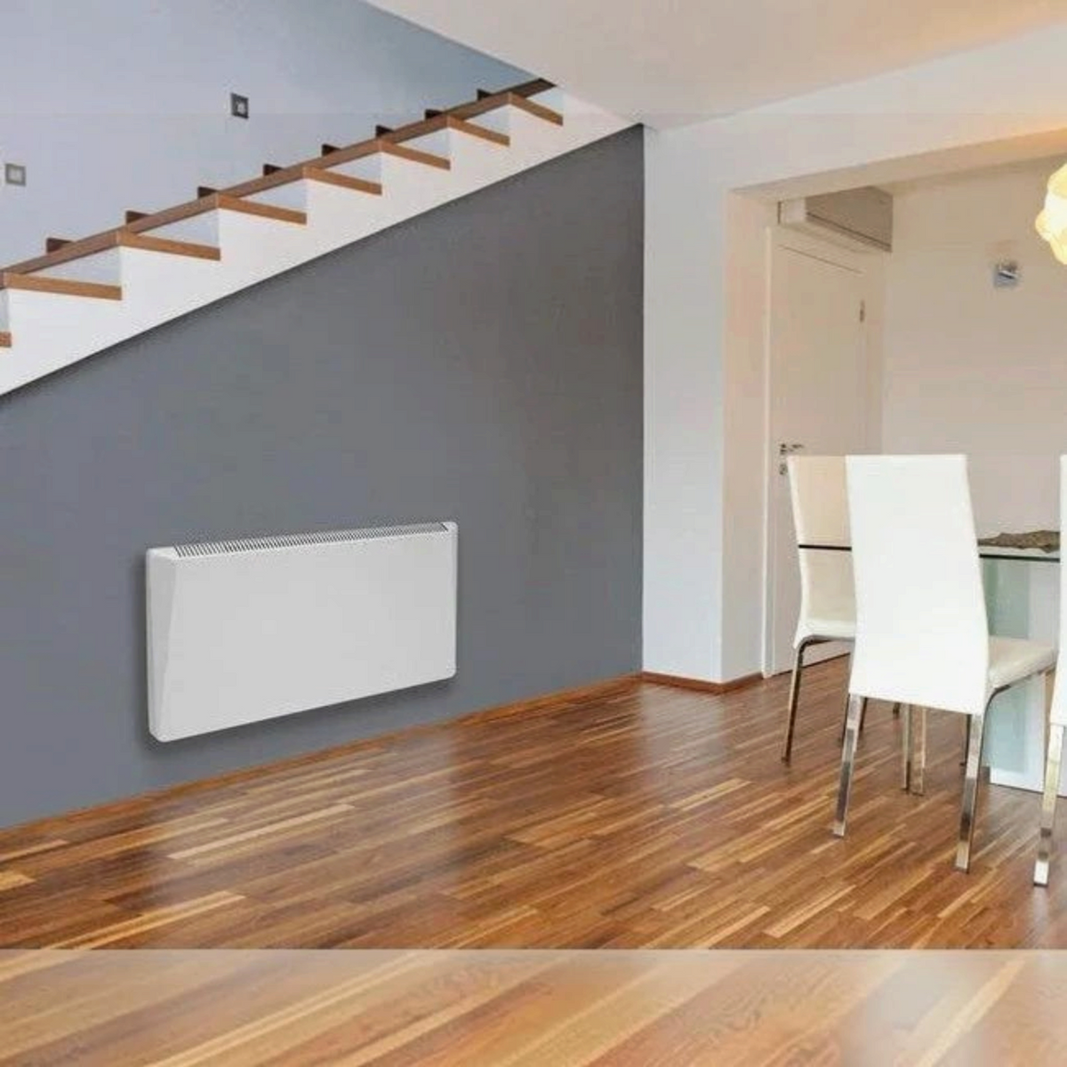 Termoconvettore elettrico digitale bianco Radialight SIRIO installato a parete in un ambiente domestico Klimago™