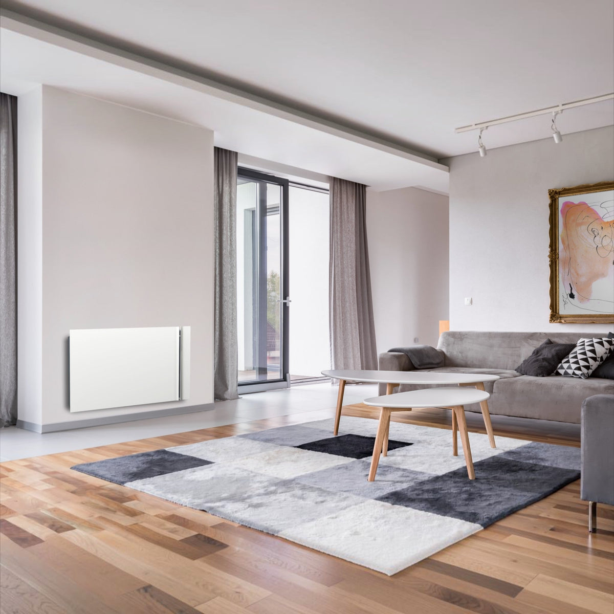 Radiatore elettrico da parete ultra piatto Radialight KYOTO bianco installato in un moderno soggiorno Klimago