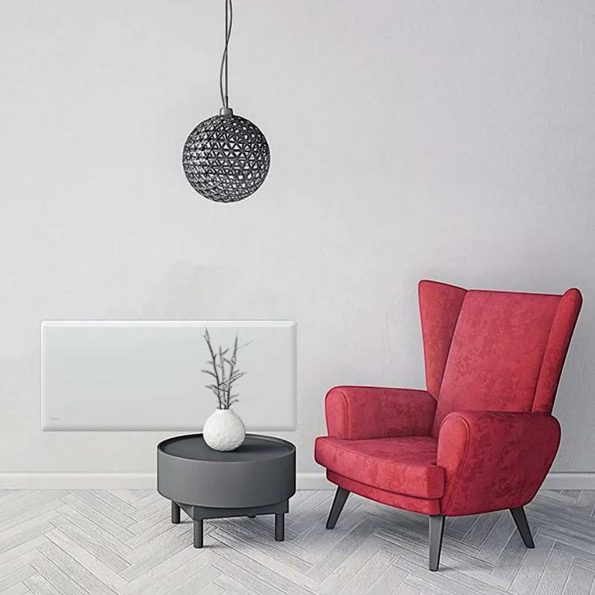 Radiatore elettrico Klimago™ NOBO TOP bianco installato a parete in un soggiorno moderno con poltrona rossa